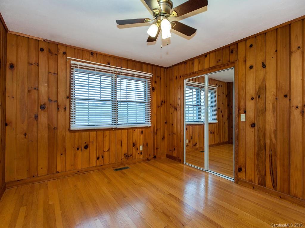 2533 Iron Duff Road Waynesville, NC 28785 - Photo 26 of 35 wooden floor in an empty room with a window