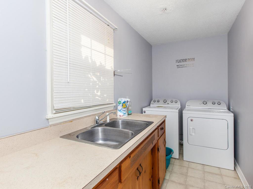 2533 Iron Duff Road Waynesville, NC 28785 - Photo 28 of 35 a utility room with dryer and washer