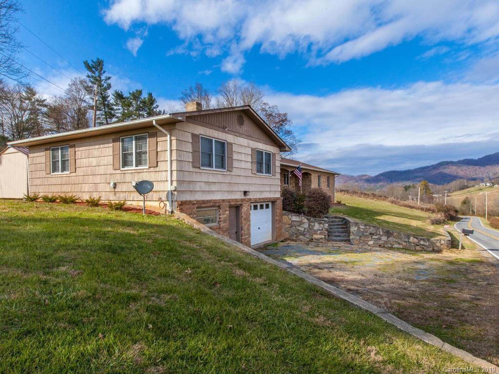 2533 Iron Duff Road Waynesville, NC 28785 - Photo 4 of 35 a view of a house with a yard