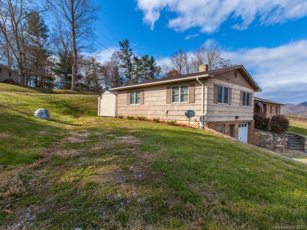 2533 Iron Duff Road Waynesville, NC 28785 - Photo 5 of 35 a view of a house with a yard