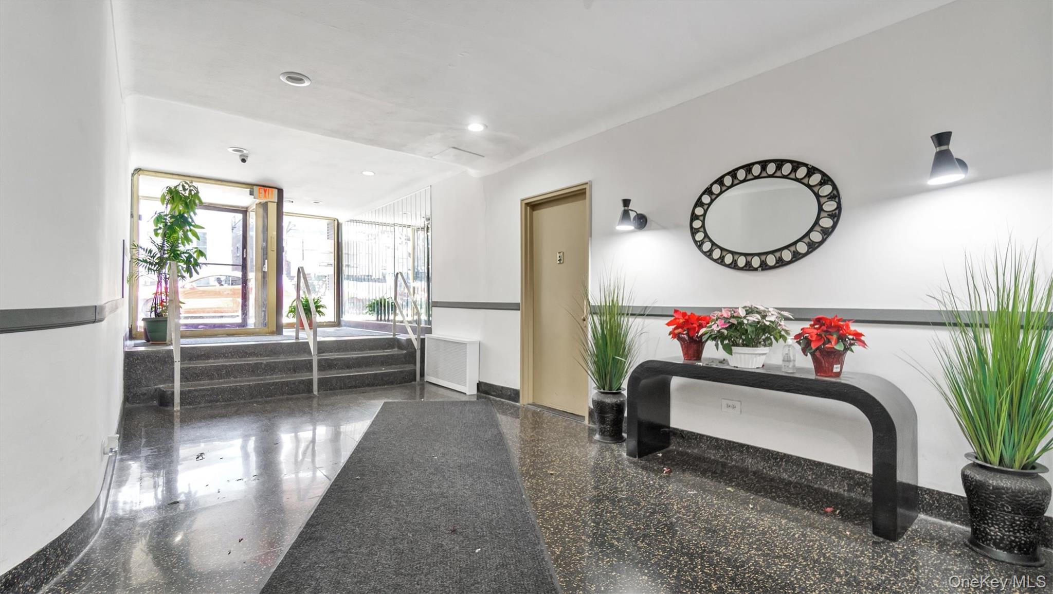 50-21 39th Place, Unit 2C Queens, NY 11104 - Photo 7 of 12 View of building lobby