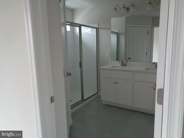 a bathroom with a sink a toilet and a bathtub