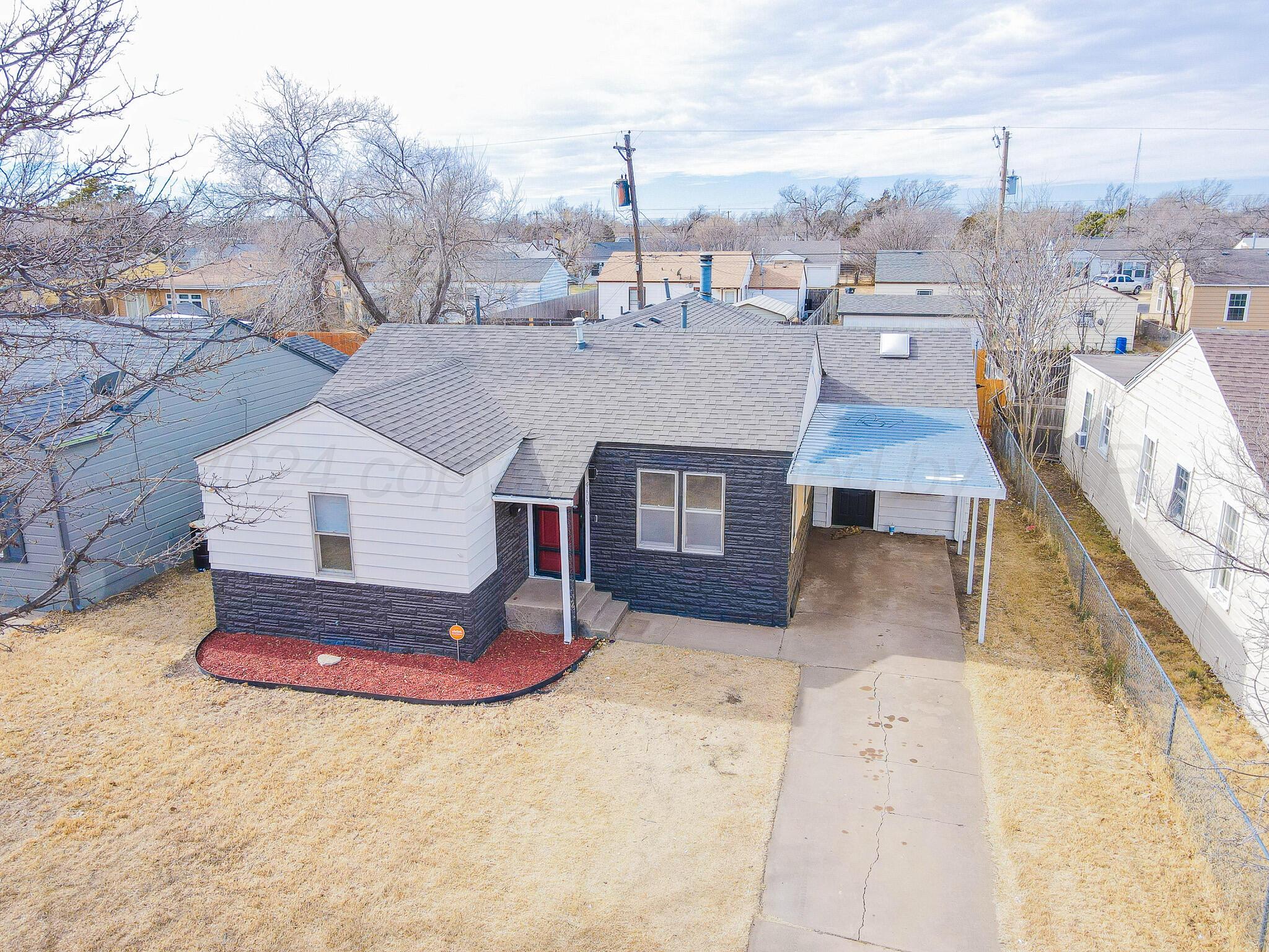4110 South Lipscomb Street Amarillo, TX 79110 - Photo 1 of 16 a view of a house with yard