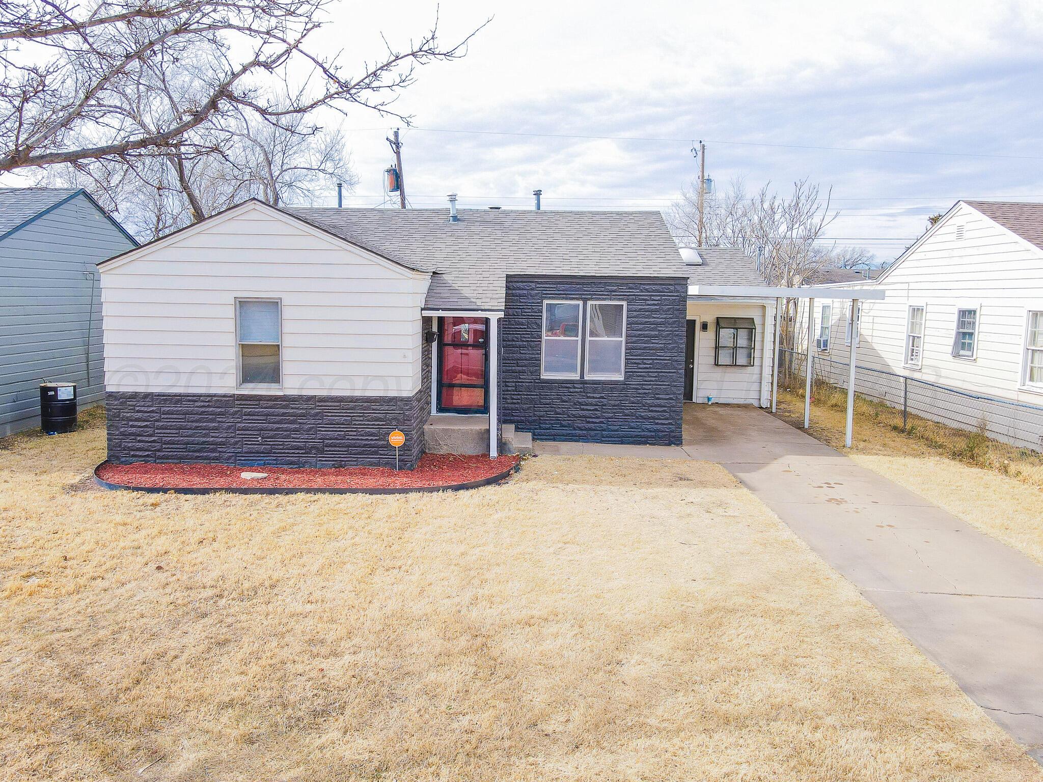 4110 South Lipscomb Street Amarillo, TX 79110 - Photo 2 of 16 a view of a house with a yard and potted plants