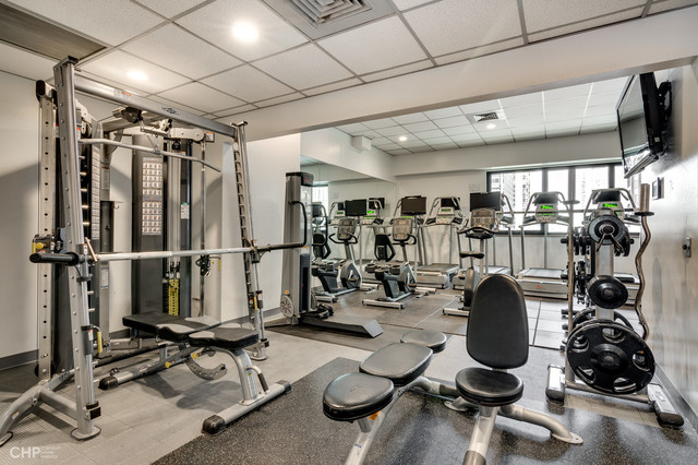 1030 North State Street, Unit 13D Chicago, IL 60610 - Photo 12 of 12 a view of a room with gym equipment