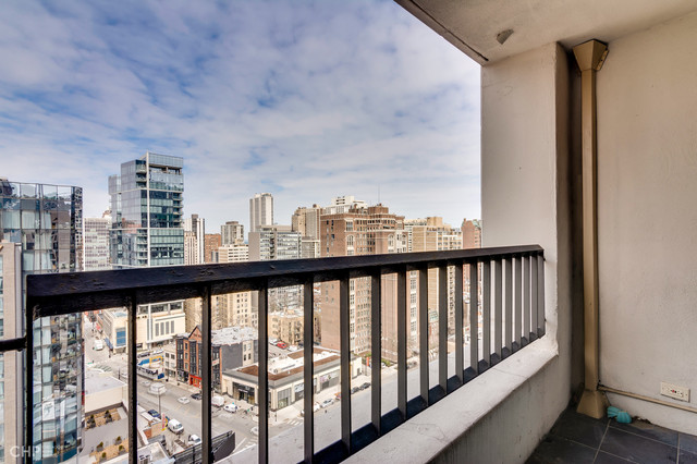 1030 North State Street, Unit 13D Chicago, IL 60610 - Photo 10 of 12 a view of city from a balcony