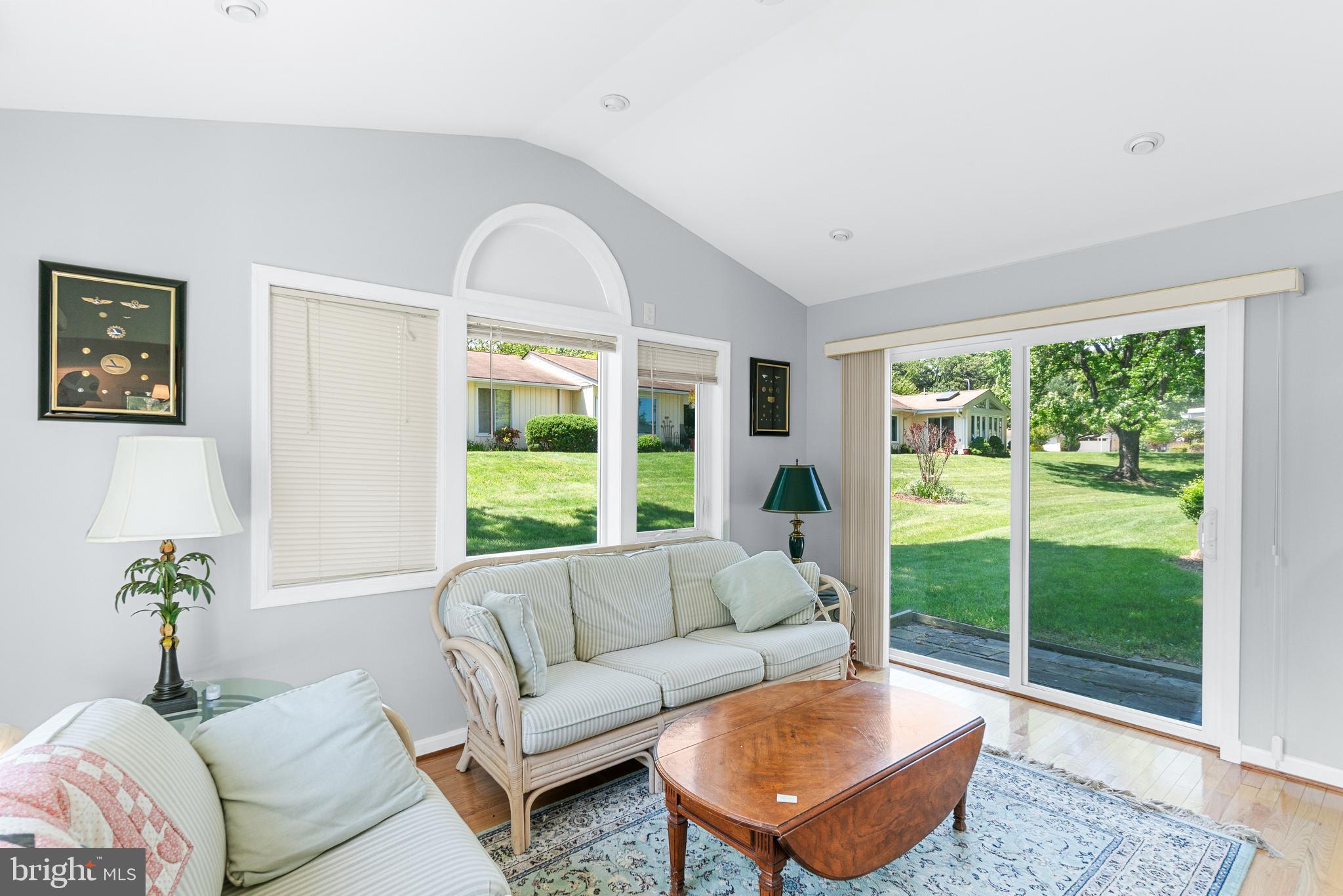 15400 Short Ridge Court, Unit 42A Silver Spring, MD 20906 - Photo 10 of 24 Large sunroom that walks out to second paver patio