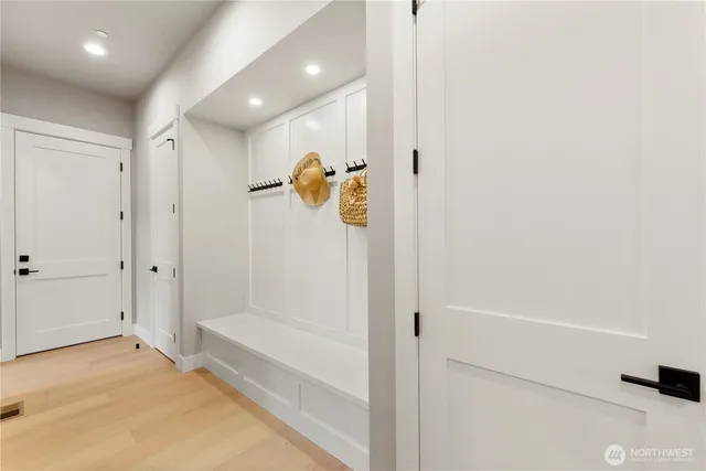 a bathroom with a tub and shower