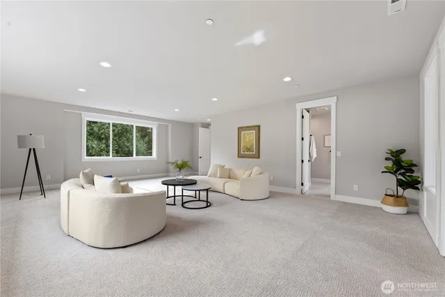 a living room with furniture and window