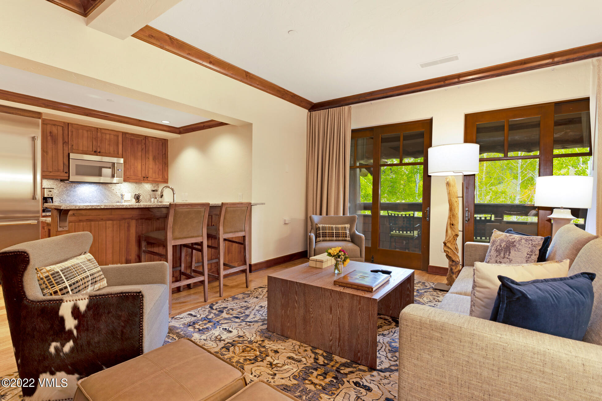 100 Bachelor Ridge Road, Unit 3704 Avon, CO 81620 - Photo 4 of 41 a living room with furniture and a large window