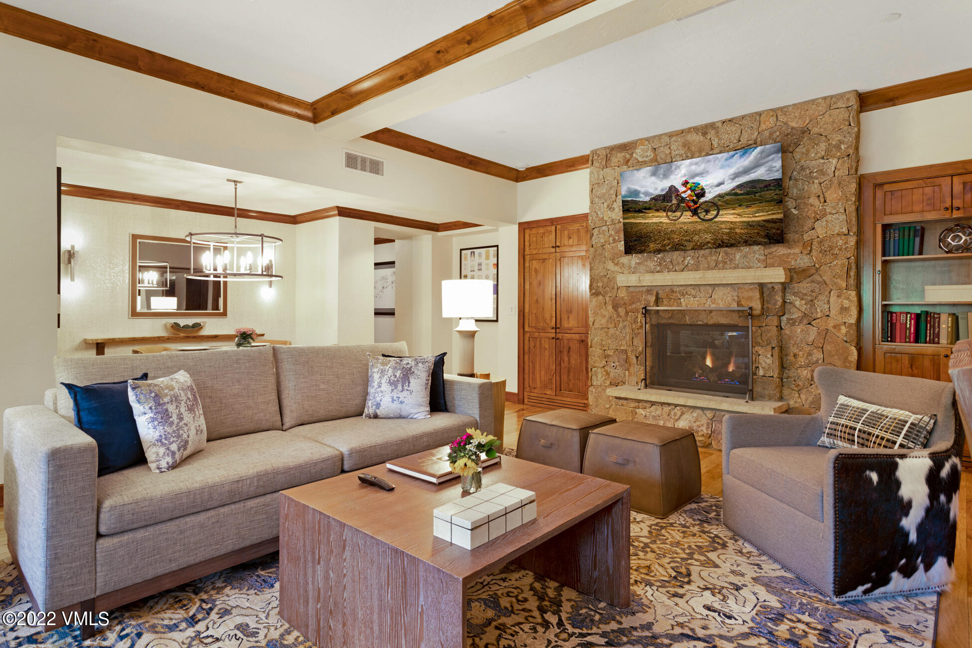 100 Bachelor Ridge Road, Unit 3704 Avon, CO 81620 - Photo 8 of 41 a living room with furniture and a fireplace