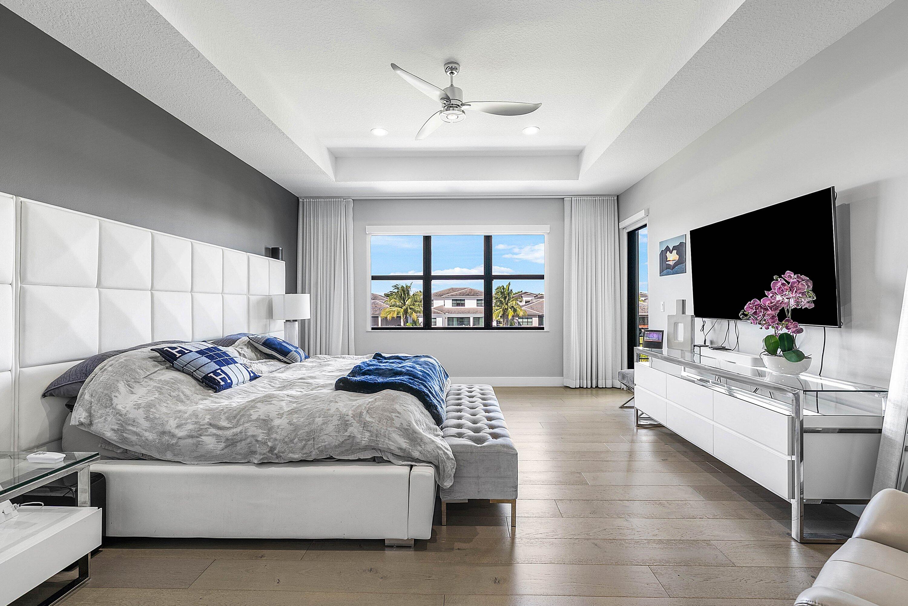 8805 New River Falls Road Boca Raton, FL 33496 - Photo 27 of 79 a living room with bed furniture and a window