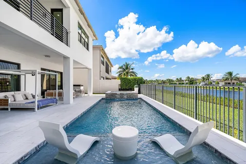 a view of an entryway with wooden floor and windows