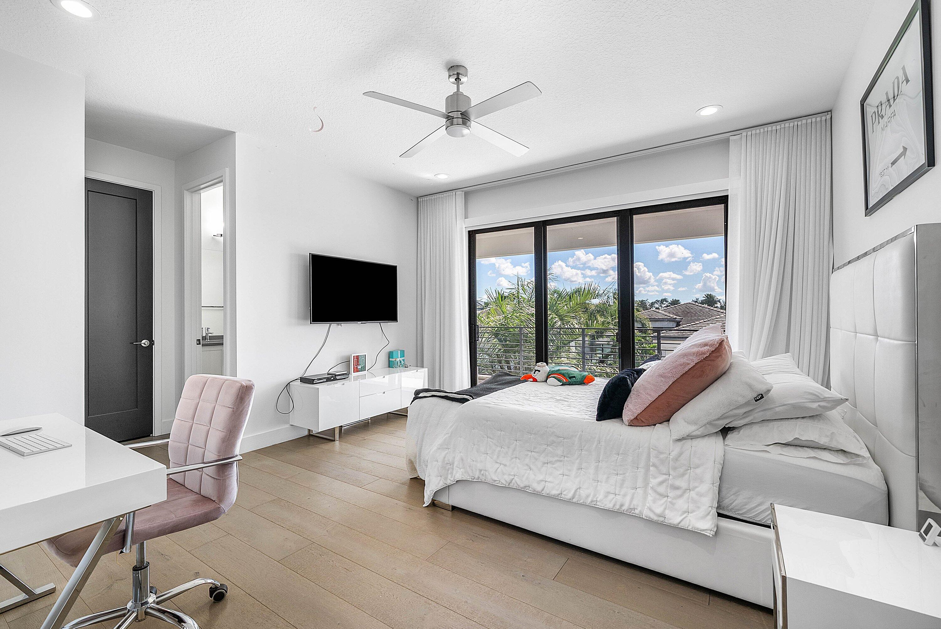 8805 New River Falls Road Boca Raton, FL 33496 - Photo 44 of 79 a living room with furniture fireplace and a flat screen tv