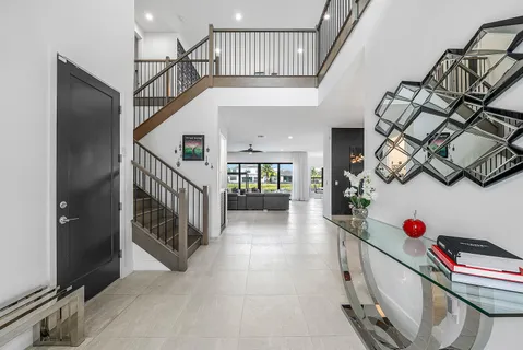 a view of a hallway with dining area