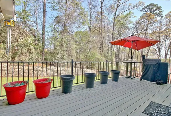 a bathroom with double sink and two mirror