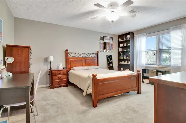 a workspace with furniture window and wooden floor