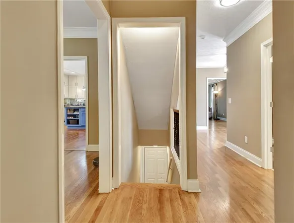 a front view of a house with a yard and fountain