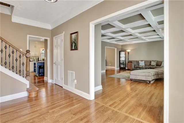 a living room with furniture and a rug