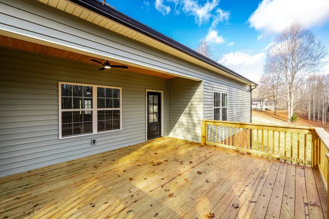 a view of swimming pool with an outdoor space and seating area
