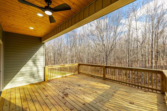 a view of a swimming pool with an outdoor space and seating area