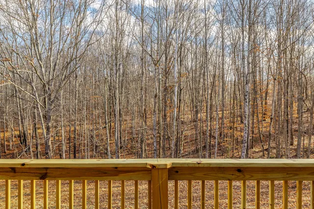 a view of a hallway with windows