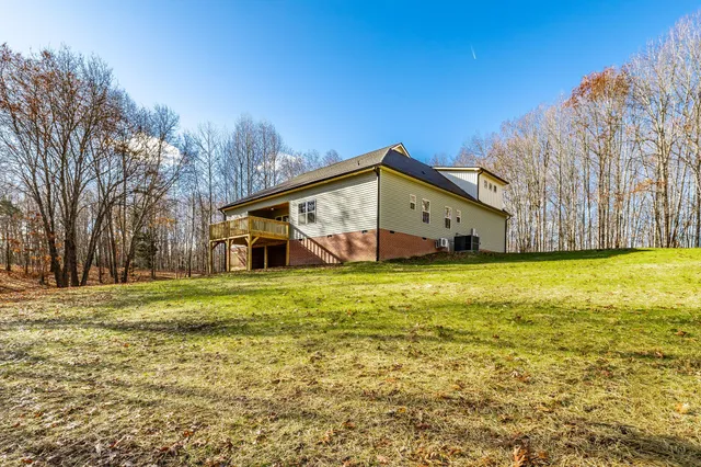 a kitchen with a sink a refrigerator and window