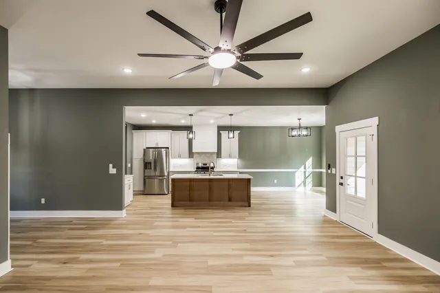a view of a bathroom from a hallway