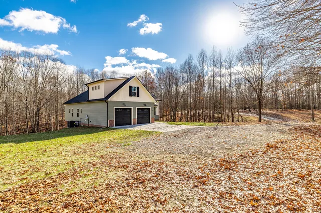 a view of swimming pool with an outdoor space and seating area