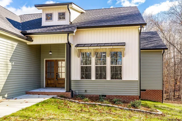 a view of outdoor space with wooden floor