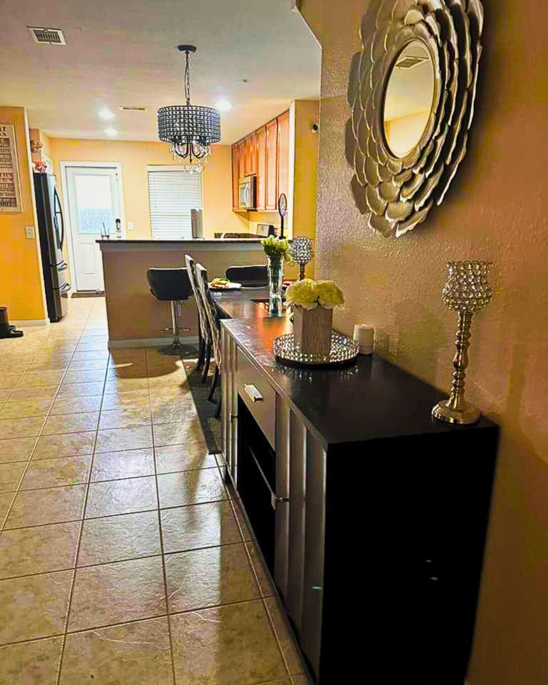 931 Salado Slough Lane Rosenberg, TX 77471 - Photo 2 of 17 a kitchen with stainless steel appliances granite countertop a sink a stove and a wooden floors