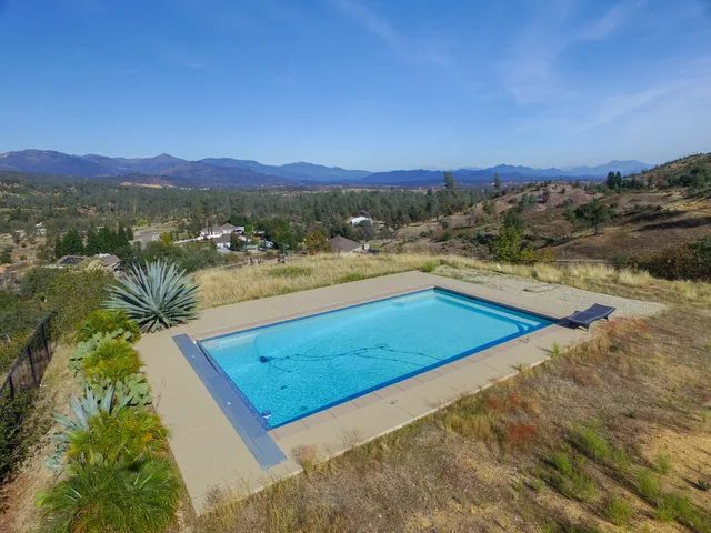 a view of lake with mountain