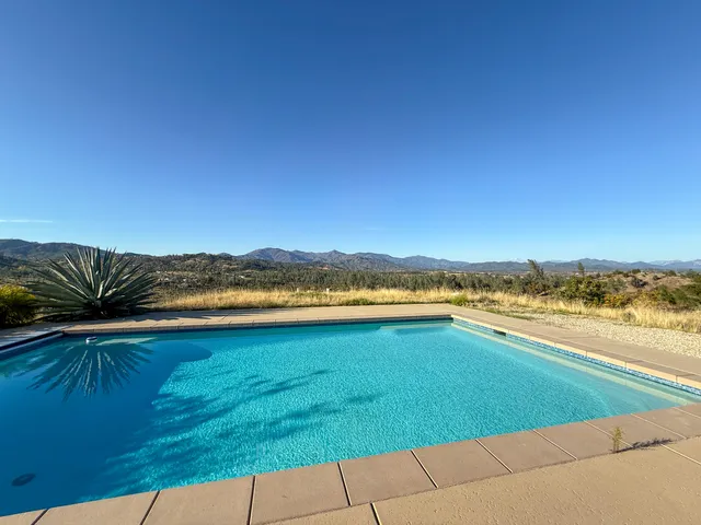 a view of a lake with a mountain