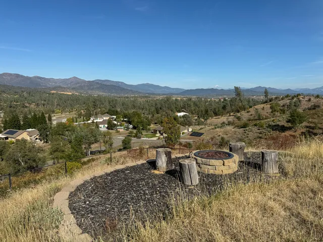 a view of a swimming pool with a lake view