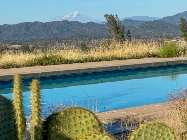 a view of swimming pool and lake view
