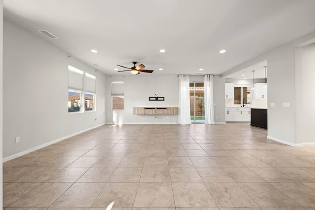 a view of a kitchen with a stove cabinets and a kitchen