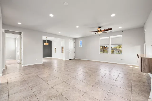 a kitchen with cabinets appliances and a sink
