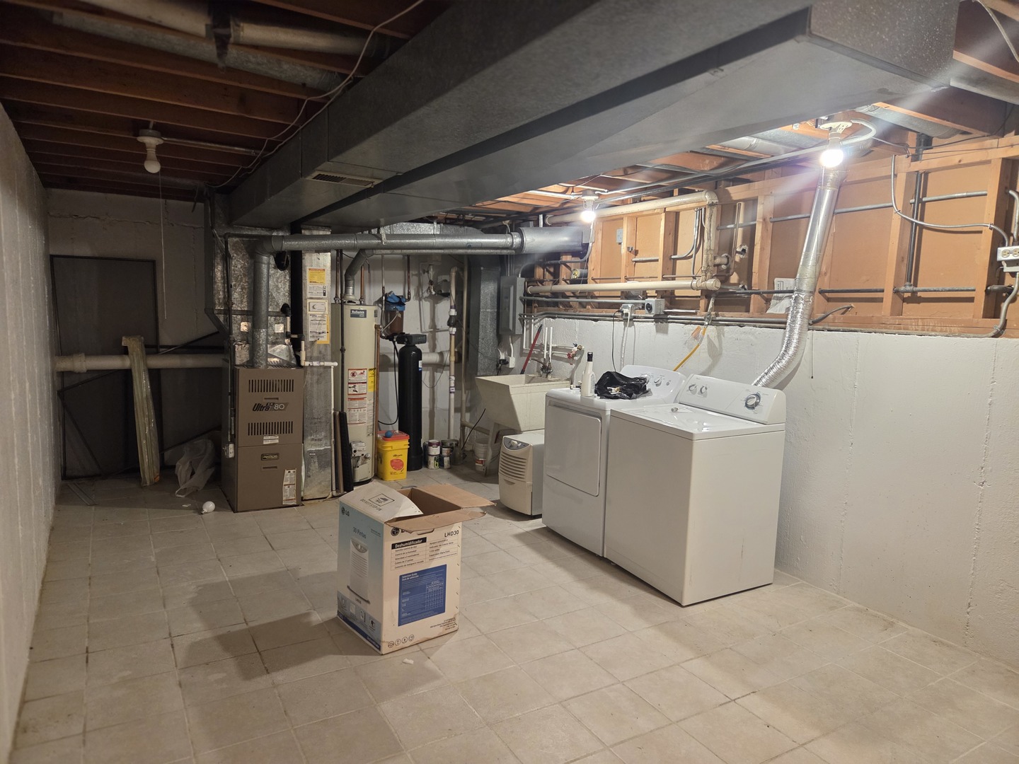 528 East Main Street Barrington, IL 60010 - Photo 15 of 18 a storage room with washer and dryer