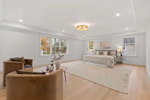 a bedroom with bed and a window