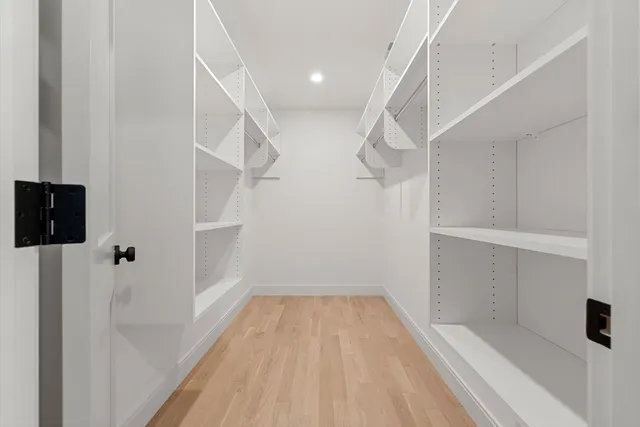 a bathroom with 2 sink and a mirror