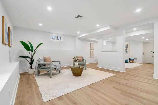 a view of a living room and dining room