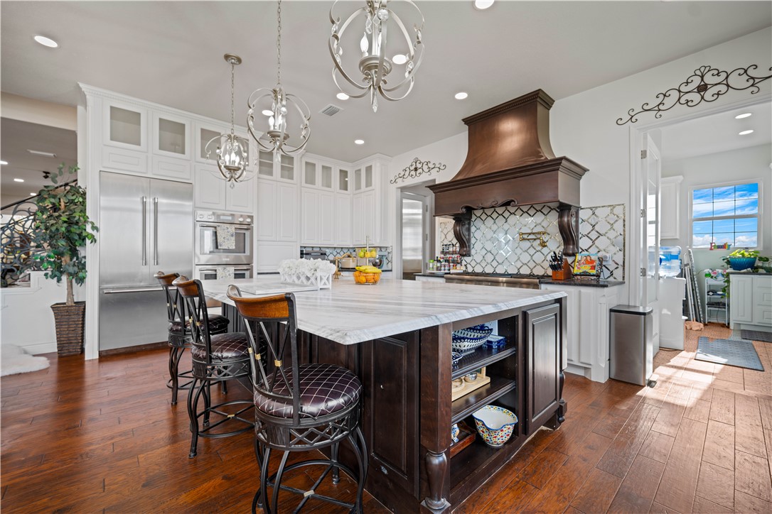 741 County Road 159 Kenedy, TX 78119 - Photo 29 of 37 a view of a dining room with furniture and wooden floor