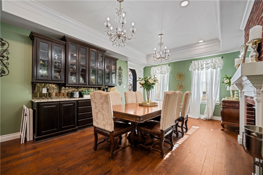741 County Road 159 Kenedy, TX 78119 - Photo 3 of 37 a view of a dining room with furniture window and wooden floor