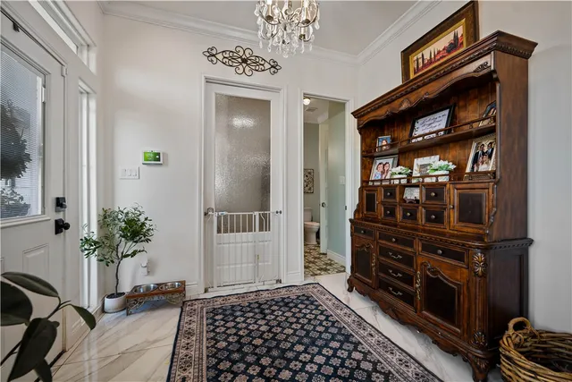 a view of room with window and flower pot