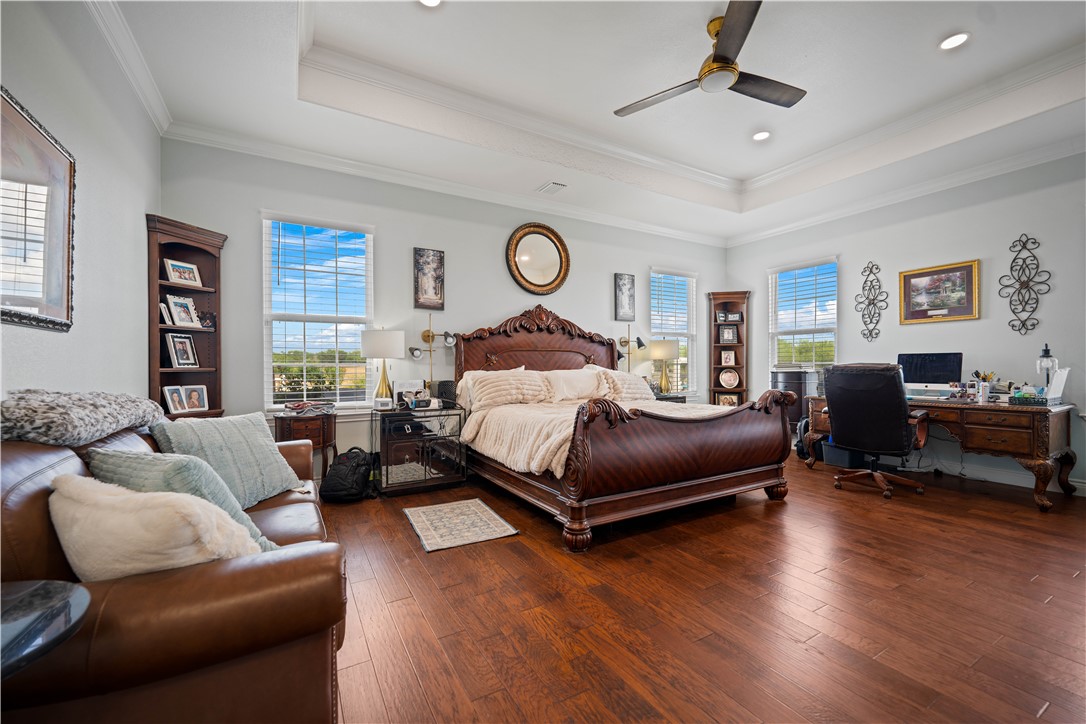741 County Road 159 Kenedy, TX 78119 - Photo 10 of 37 a bedroom with a bed couch and a window