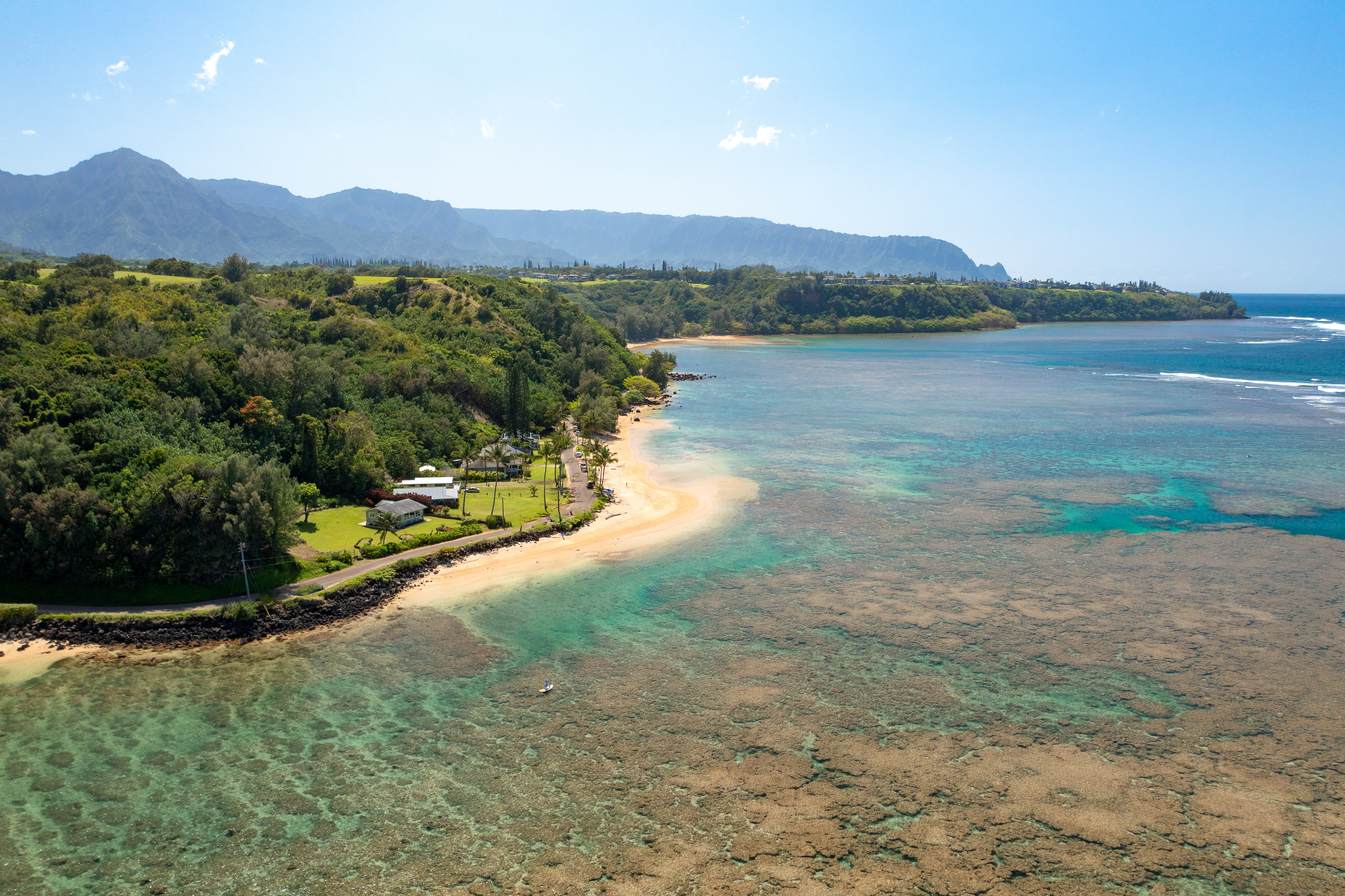 4261 Anini Road, Unit 2 Princeville, HI 96722 - Photo 2 of 28 a view of a lake with a mountain