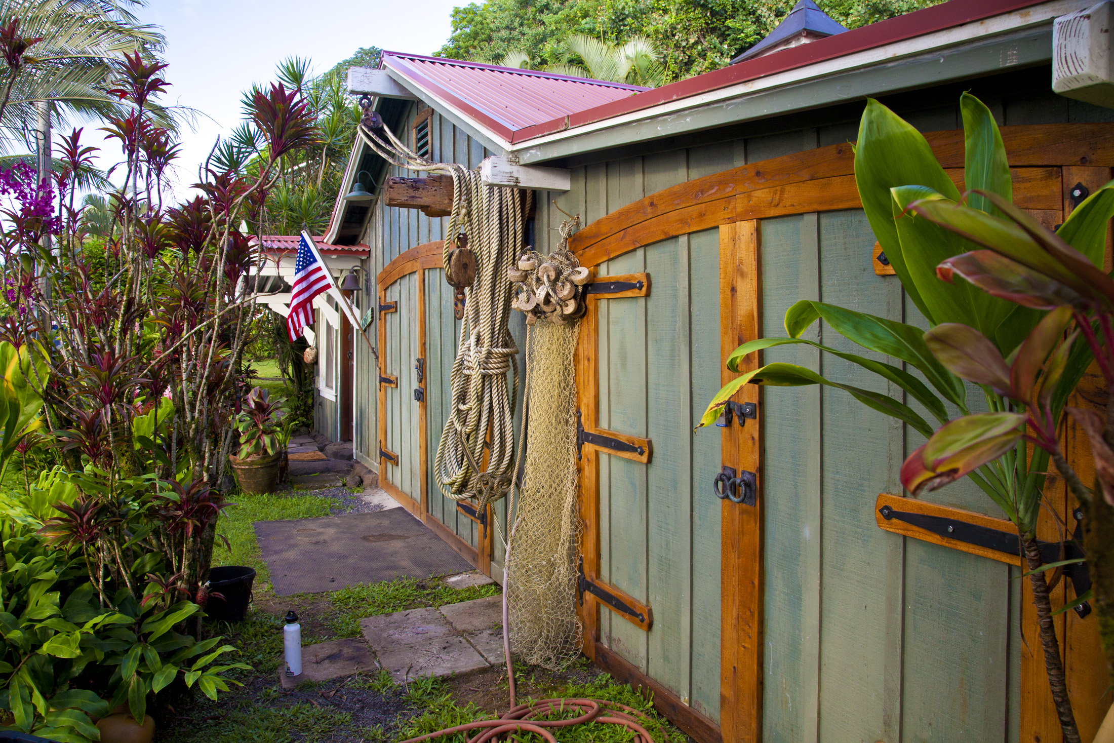 4261 Anini Road, Unit 2 Princeville, HI 96722 - Photo 5 of 28 a backyard of a house with seating space