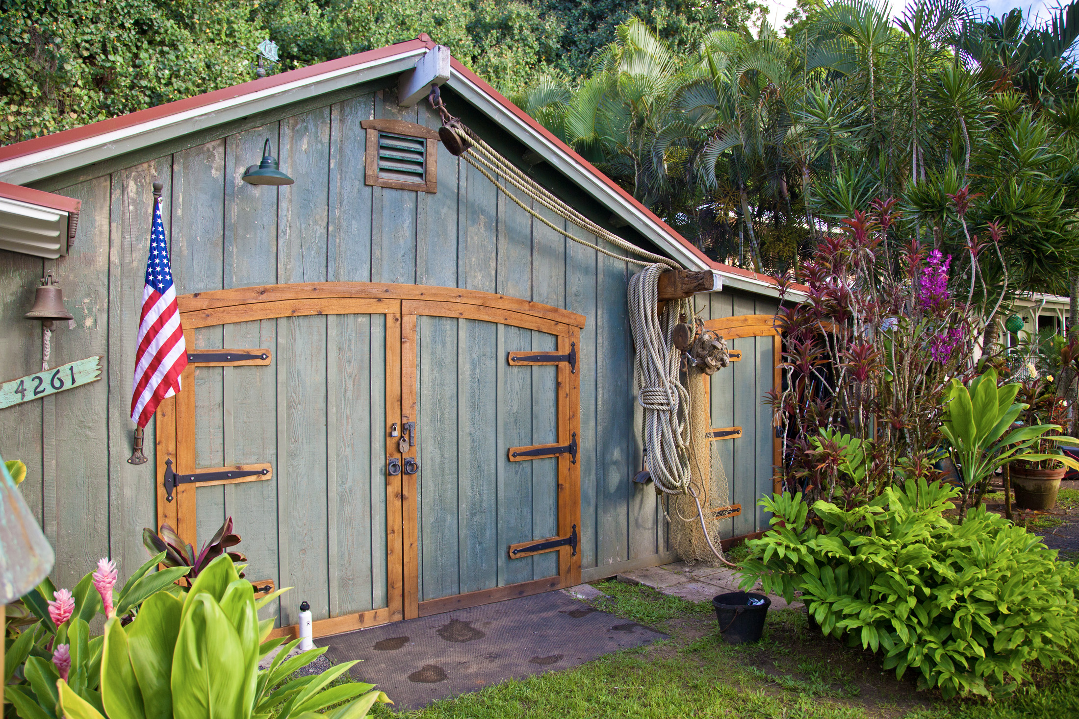 4261 Anini Road, Unit 2 Princeville, HI 96722 - Photo 9 of 28 a backyard of a house with lots of green space