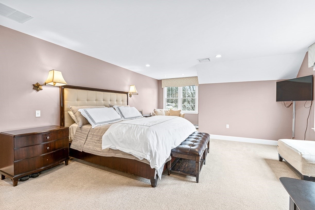54 Homestead Park Needham, MA 02494 - Photo 14 of 26 a spacious bedroom with a bed and window