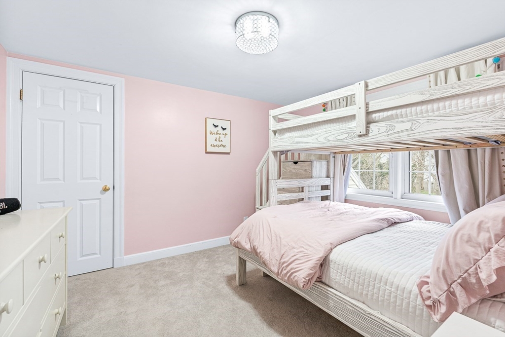 54 Homestead Park Needham, MA 02494 - Photo 18 of 26 a bedroom with a bed and a window